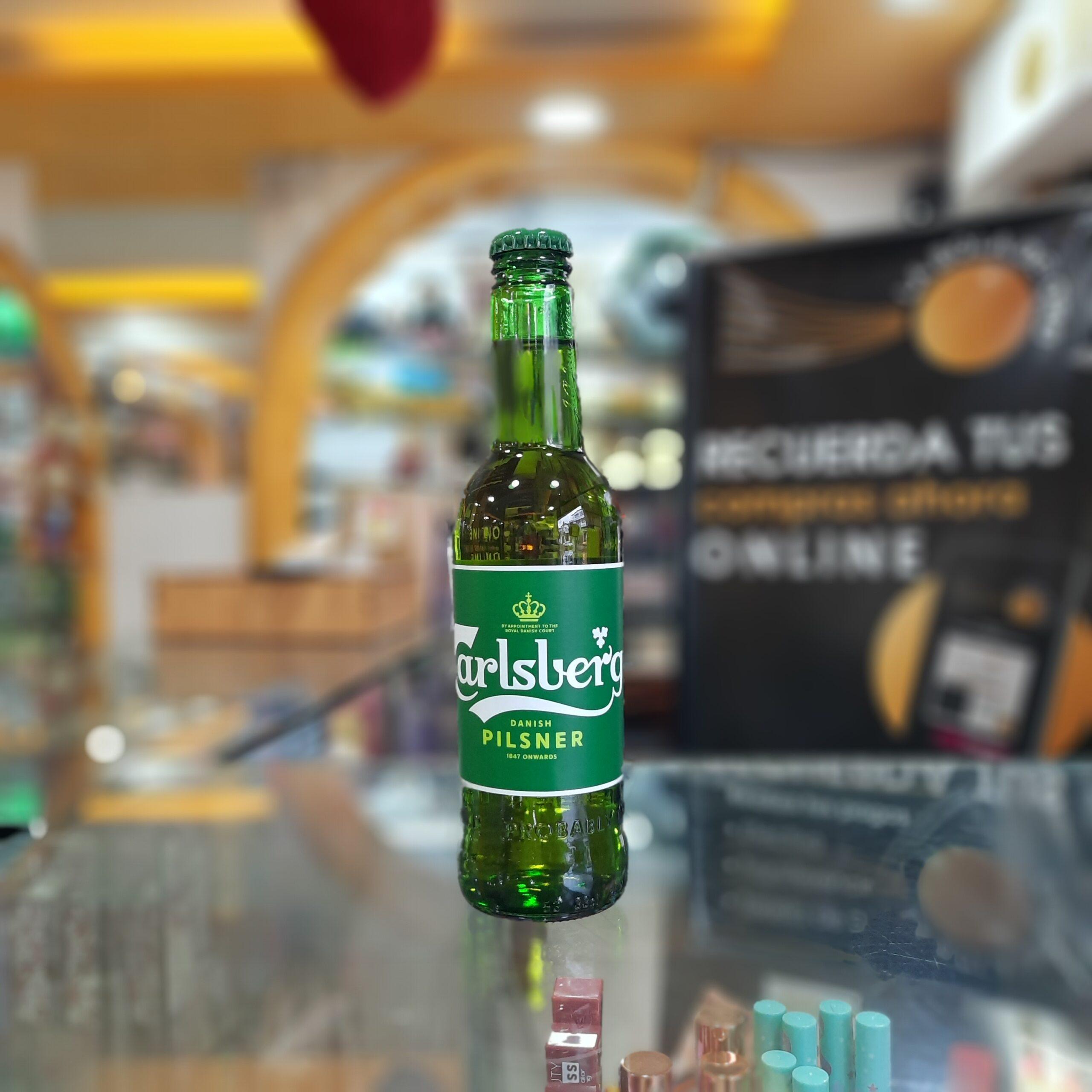 CARLSBERG CERVEZA DANESA BOTELLA 330ML LA BOLA DE ORO QUITO